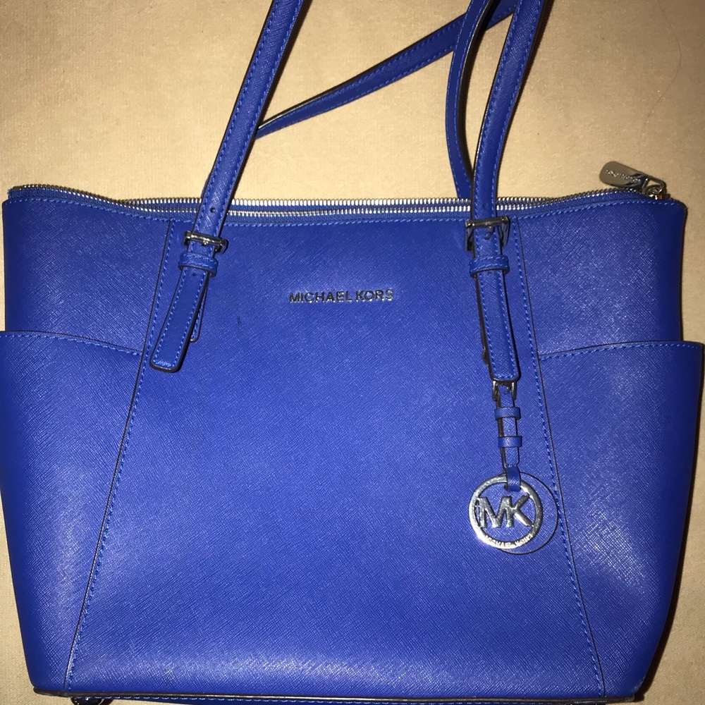 Blue MICHAEL KORS JET SET handbag gently used